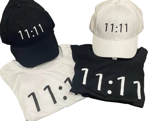 Black and white t-shirts and caps with '11:11' text 